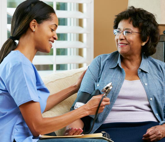 Image of nursing assessment with client.
